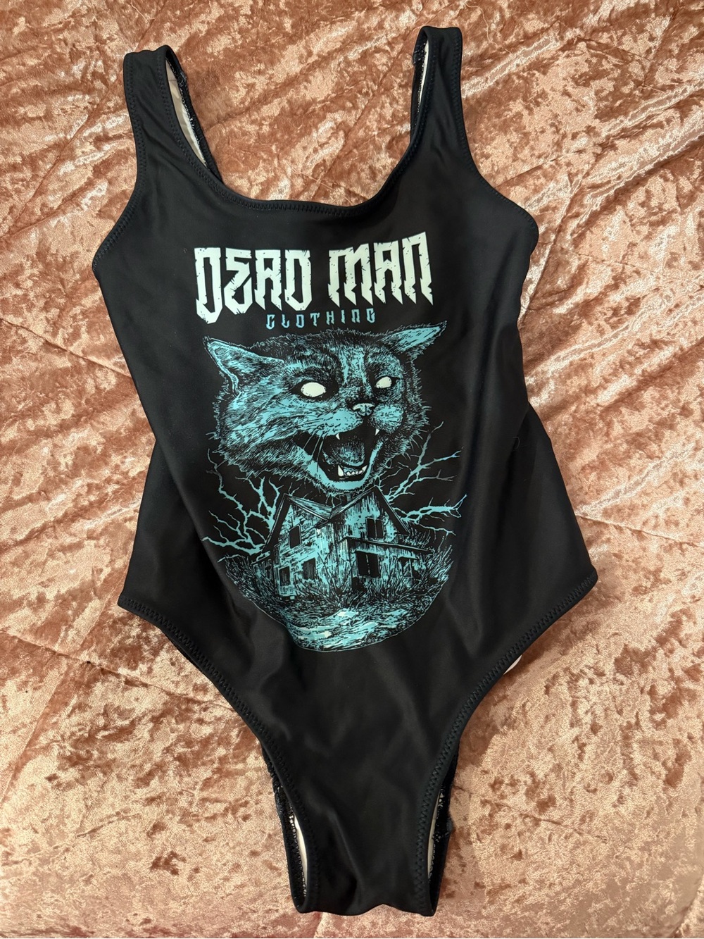 Dead Man Cat Haunted House Graphic Black One-Piece Swimsuit with Teal Print